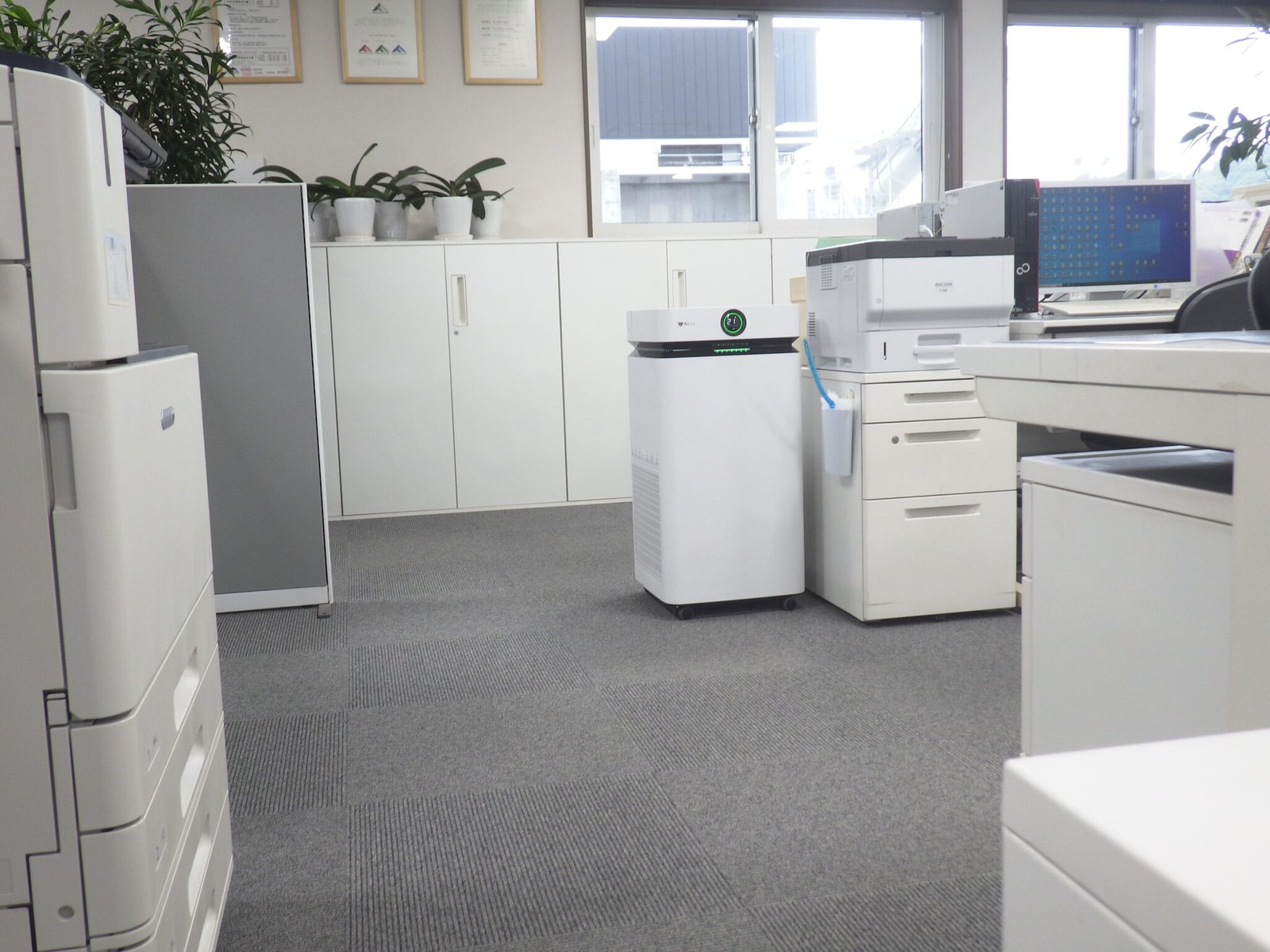 Airdog air purifier in an open office space